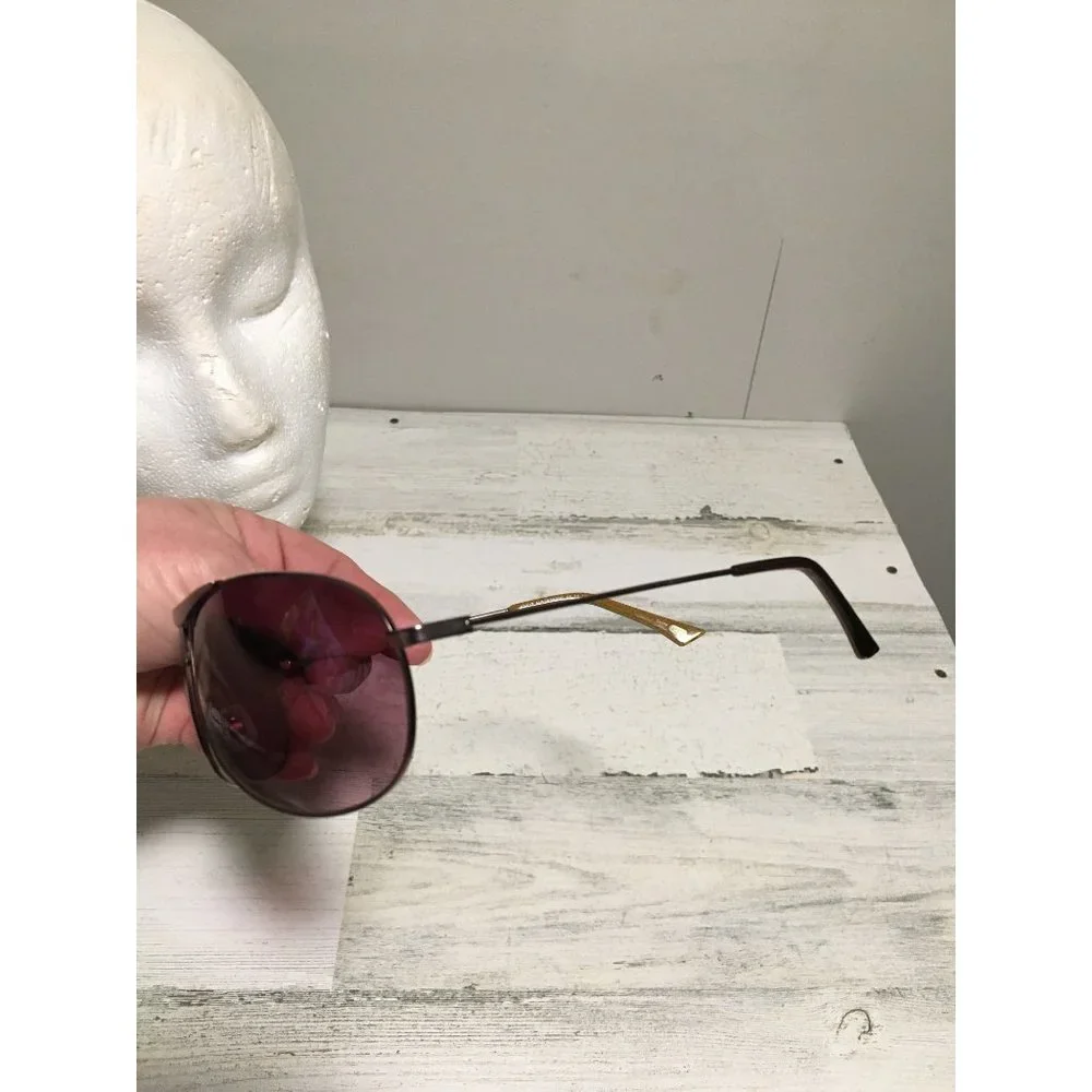 Fossil unisex aviator sunglasses with dark brown lenses and bronze frames